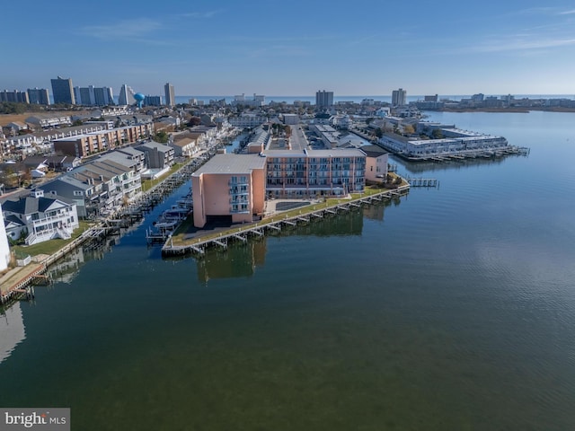 aerial view with a water view and a view of city