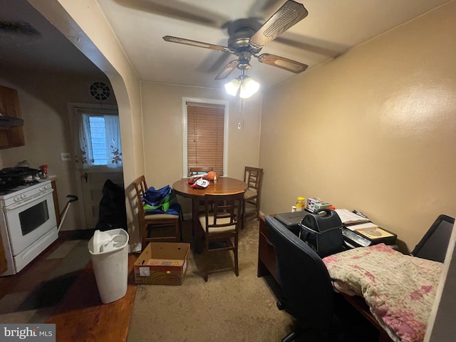 dining room featuring carpet and ceiling fan