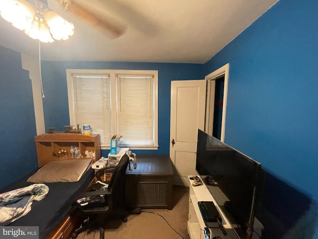 office area with ceiling fan and light colored carpet