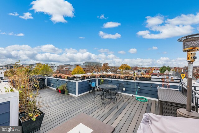 wooden deck featuring grilling area