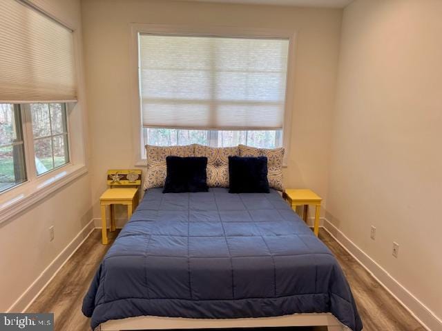 bedroom featuring wood-type flooring