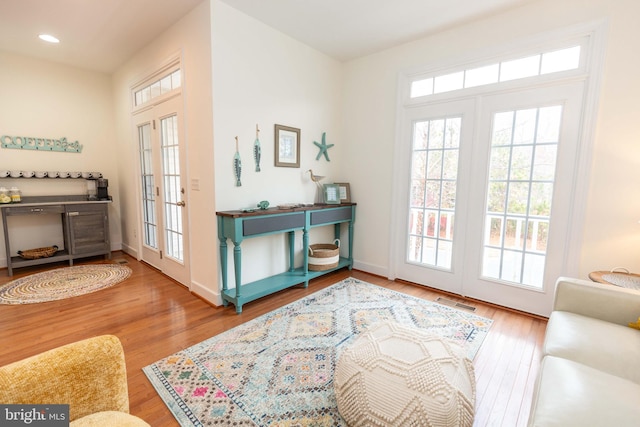 doorway to outside with hardwood / wood-style floors