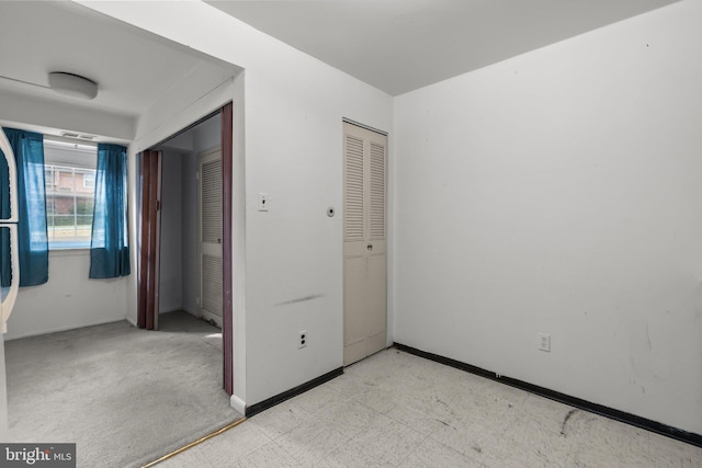 unfurnished bedroom featuring a closet