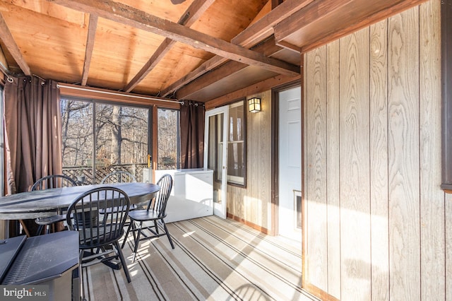 sunroom / solarium with wood ceiling and vaulted ceiling