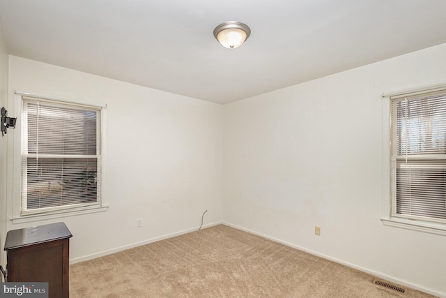 view of carpeted empty room