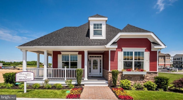 view of front of home featuring covered porch