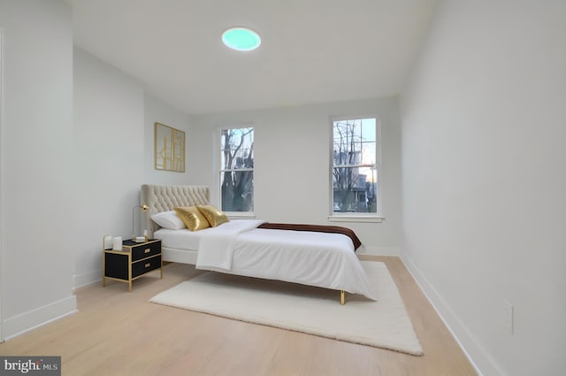 bedroom featuring light wood-type flooring