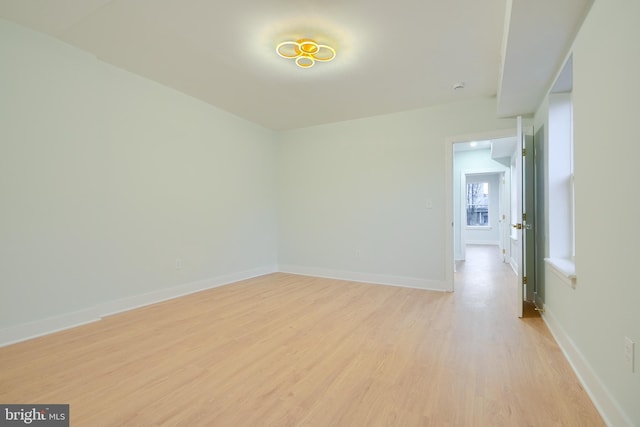 unfurnished room featuring light hardwood / wood-style floors