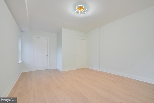 empty room with light wood-type flooring