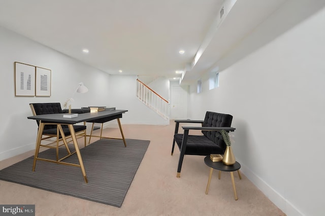 office area with light colored carpet