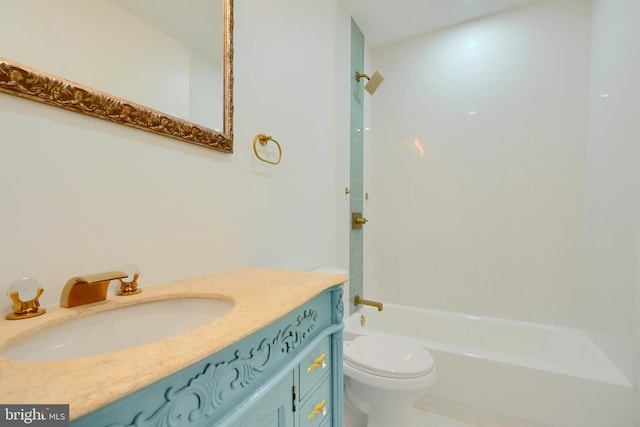 full bathroom with vanity, toilet, and tiled shower / bath