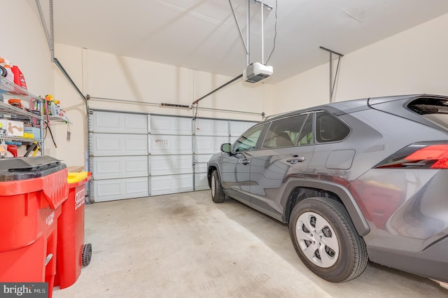 garage featuring a garage door opener