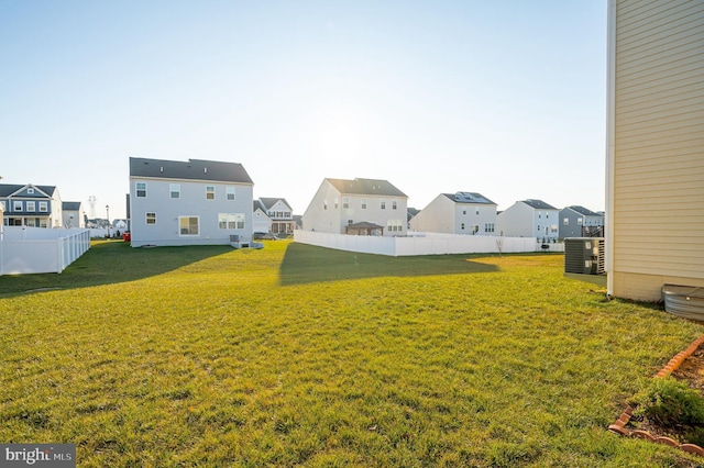 view of yard featuring central AC