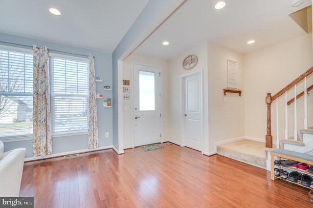 entrance foyer with hardwood / wood-style floors