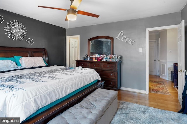 bedroom featuring light hardwood / wood-style floors and ceiling fan