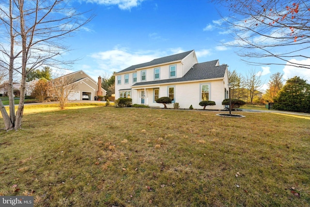 front facade with a front yard