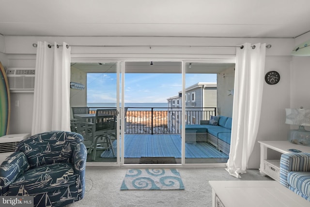 6803 Atlantic Ave Unit 3K, Ocean City, MD 21842 - living area with carpet, a wall mounted air conditioner, and a water view