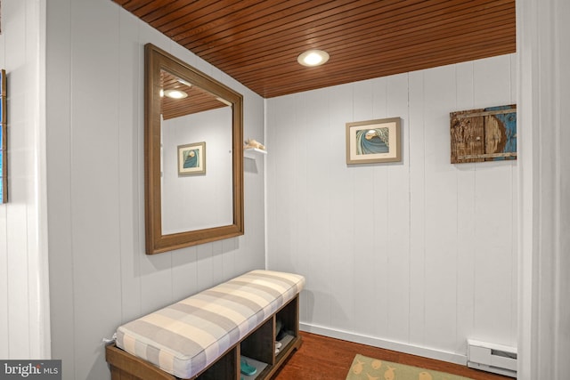 6803 Atlantic Ave Unit 3K, Ocean City, MD 21842 - corridor with a baseboard radiator, wood ceiling, and dark wood-style flooring