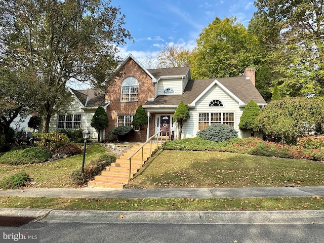 view of front property featuring a front yard