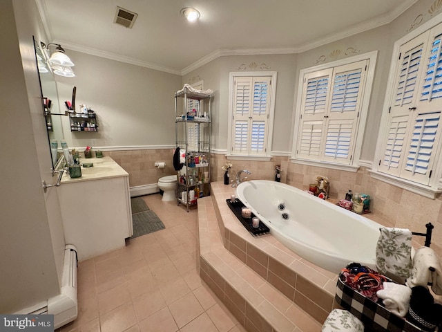 bathroom featuring vanity, a relaxing tiled tub, toilet, and ornamental molding