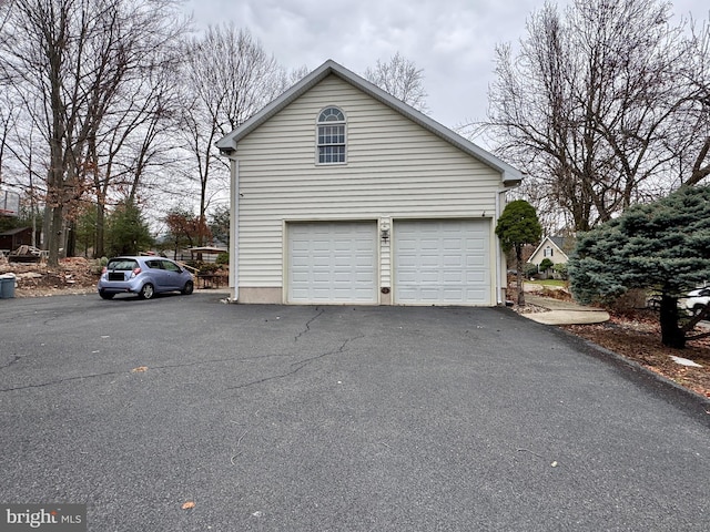 exterior space with a garage