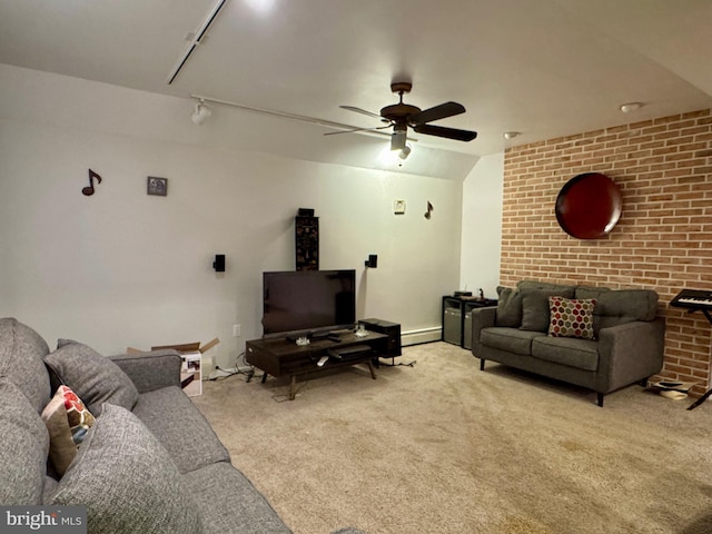 living room featuring ceiling fan, light colored carpet, and baseboard heating