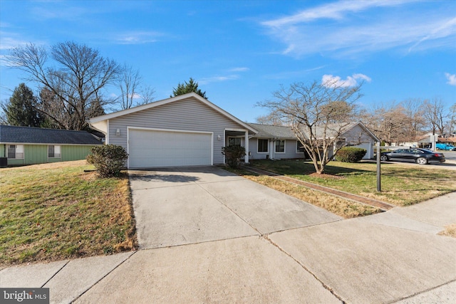 ranch-style home featuring a front lawn and a garage