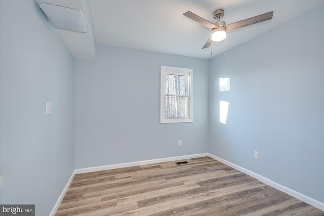 unfurnished room featuring light hardwood / wood-style floors and ceiling fan