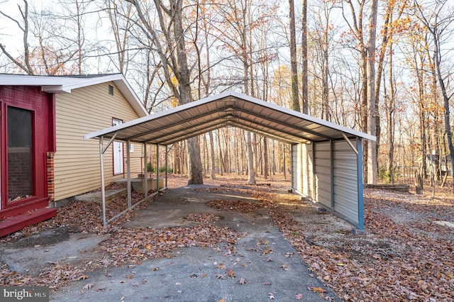 view of vehicle parking with a carport