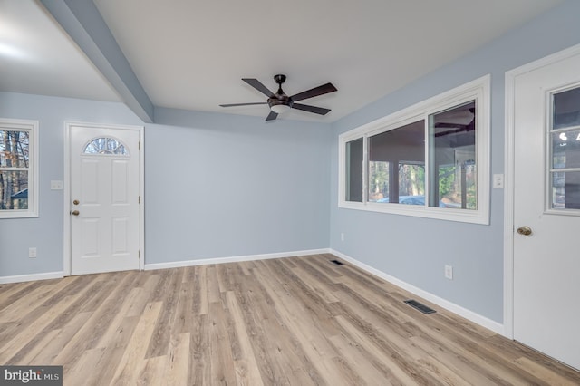 foyer featuring ceiling fan and light hardwood / wood-style flooring