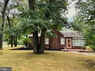 exterior space with a front yard