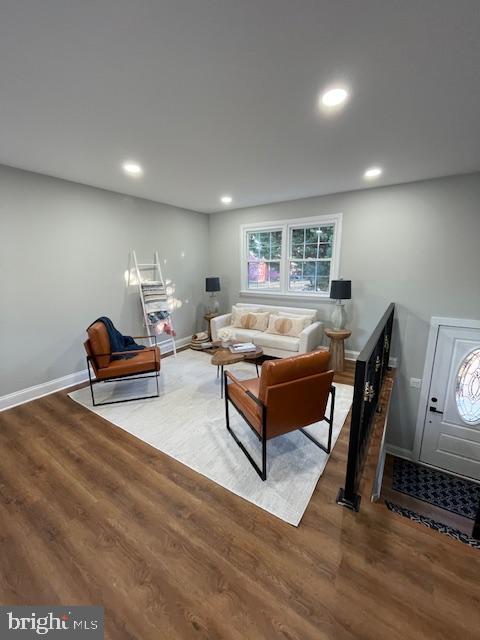 living room with hardwood / wood-style floors