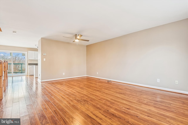 unfurnished room featuring ceiling fan and light hardwood / wood-style flooring