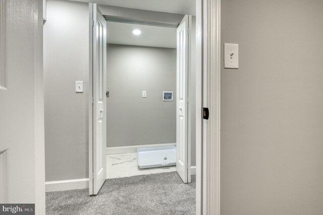 corridor with carpet floors