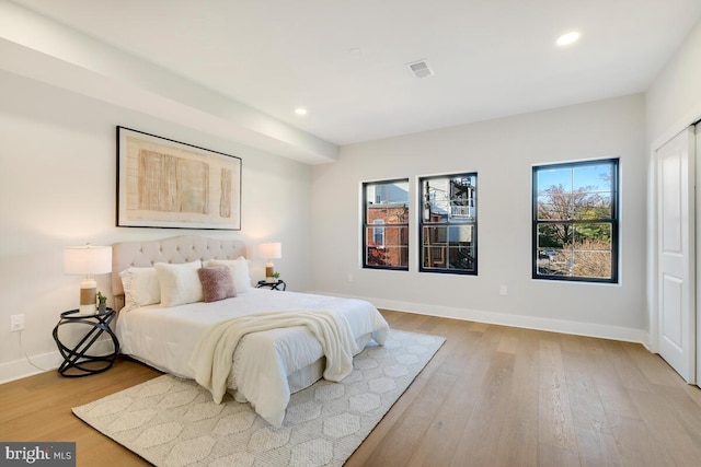 bedroom with light hardwood / wood-style flooring