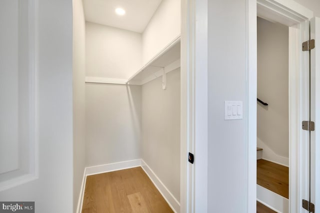 walk in closet featuring light wood-type flooring