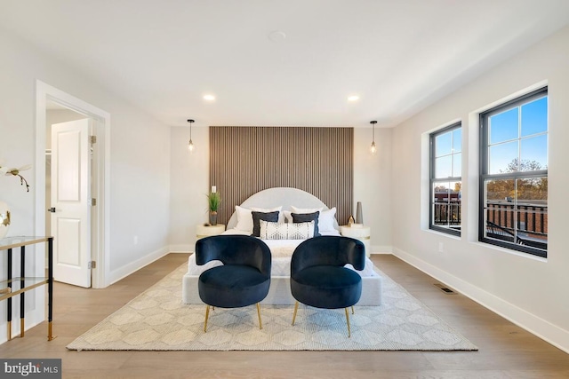 bedroom with light hardwood / wood-style floors