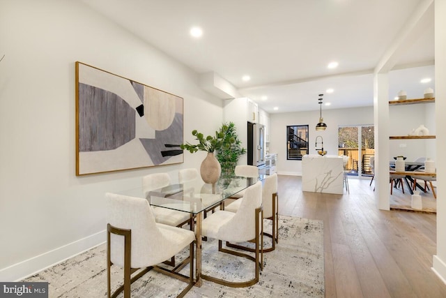 dining room featuring light hardwood / wood-style floors