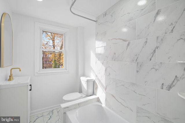 bathroom featuring toilet and sink