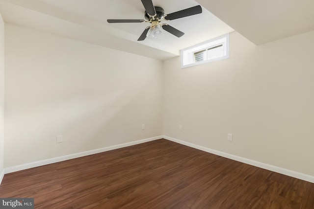 unfurnished room featuring ceiling fan and dark hardwood / wood-style floors