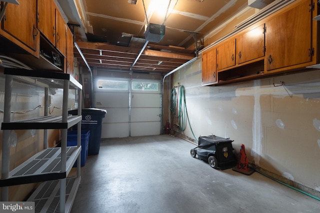 garage featuring a garage door opener