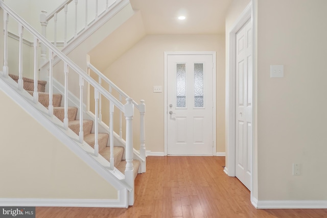 foyer entrance featuring wood-type flooring