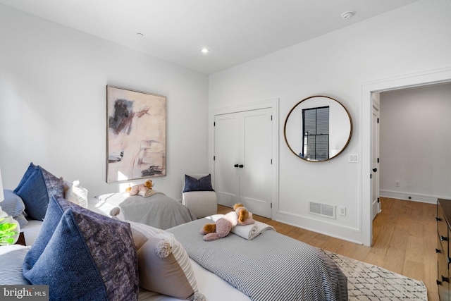 bedroom with light hardwood / wood-style flooring