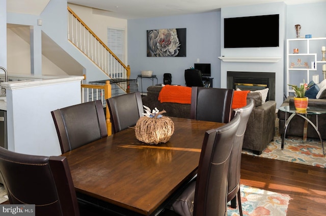 dining area featuring hardwood / wood-style flooring