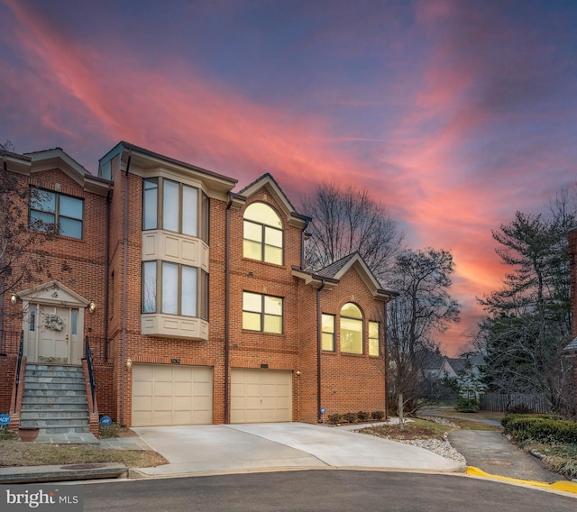 view of front of property with a garage