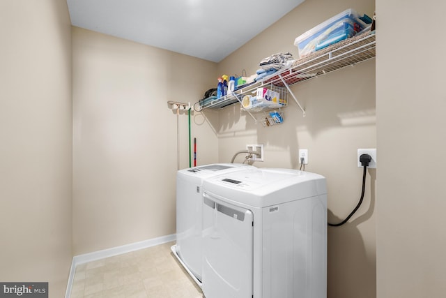 washroom featuring independent washer and dryer