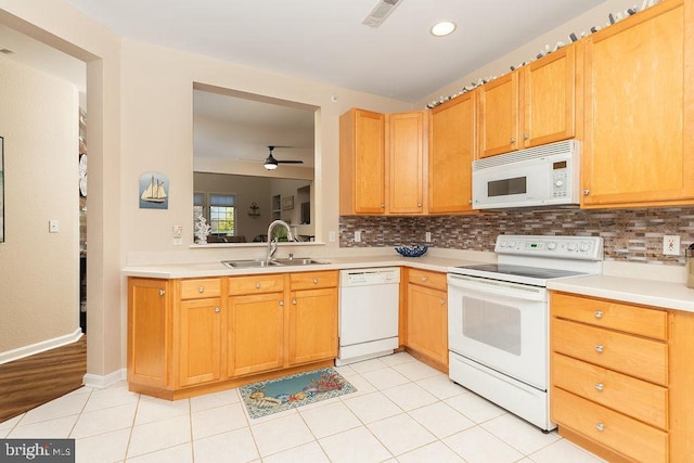 kitchen with decorative backsplash, white appliances, ceiling fan, sink, and light tile patterned floors