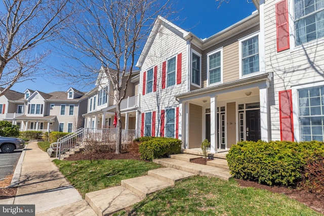 54 October Glory Ave Unit 54F, Ocean View, DE 19970 - view of property featuring a residential view and a porch