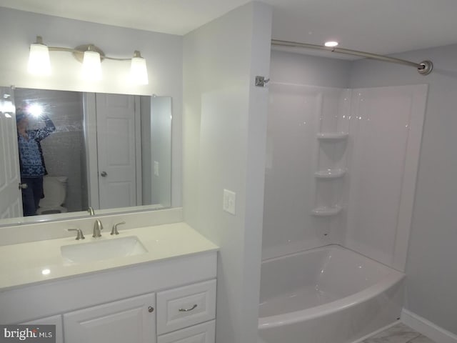 full bathroom with vanity, toilet, and bathtub / shower combination