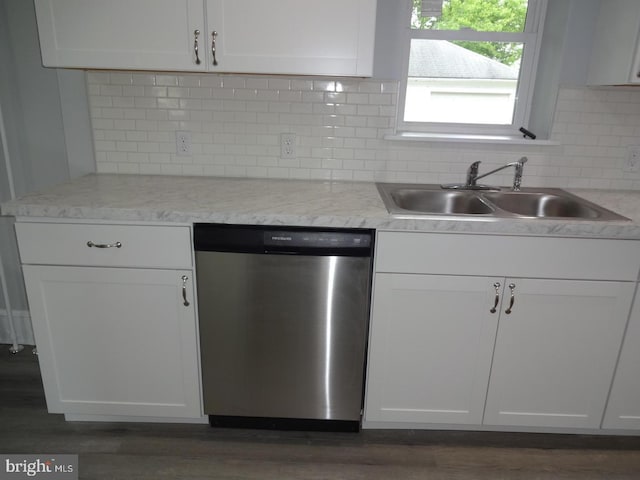 kitchen with dishwasher, white cabinets, dark hardwood / wood-style floors, and sink